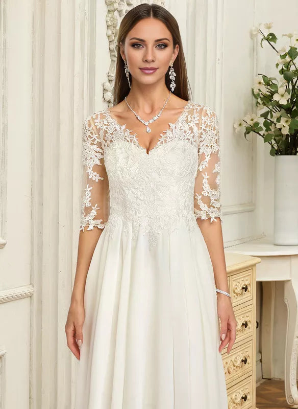 Vestido de novia asimétrico de gasa con encaje y escote en V y volantes