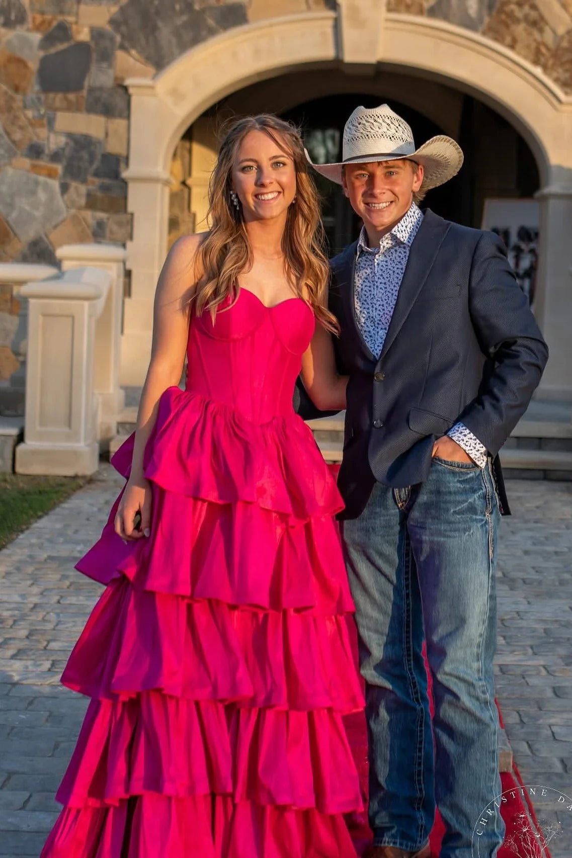 Bold Fuchsia Strapless Prom Dress with Corset Bodice and Tiered Ruffle Skirt