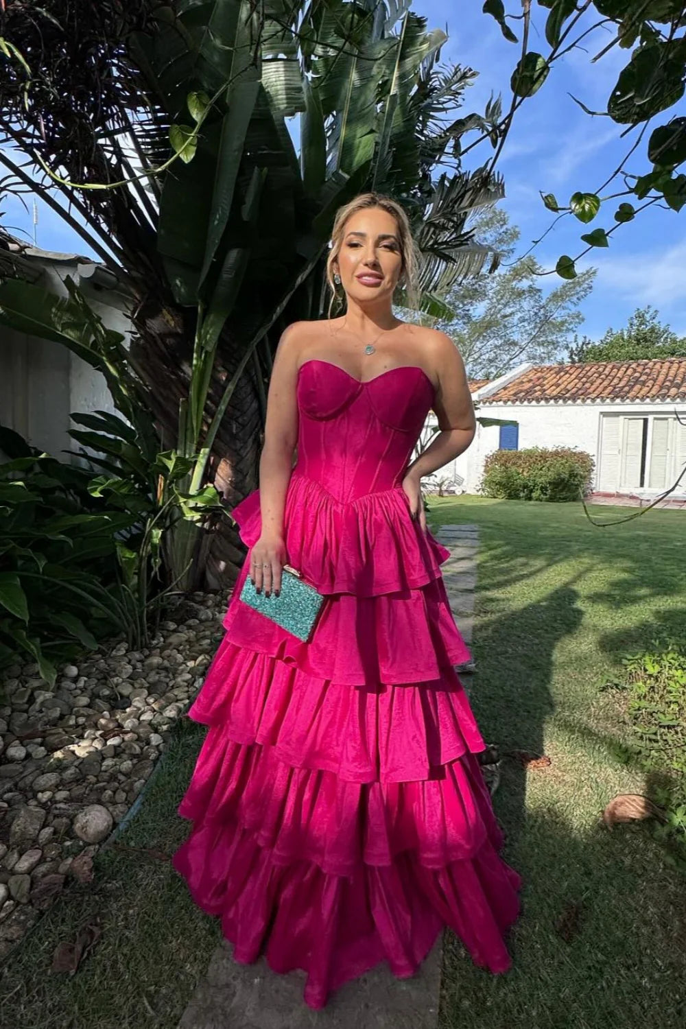 Bold Fuchsia Strapless Prom Dress with Corset Bodice and Tiered Ruffle Skirt