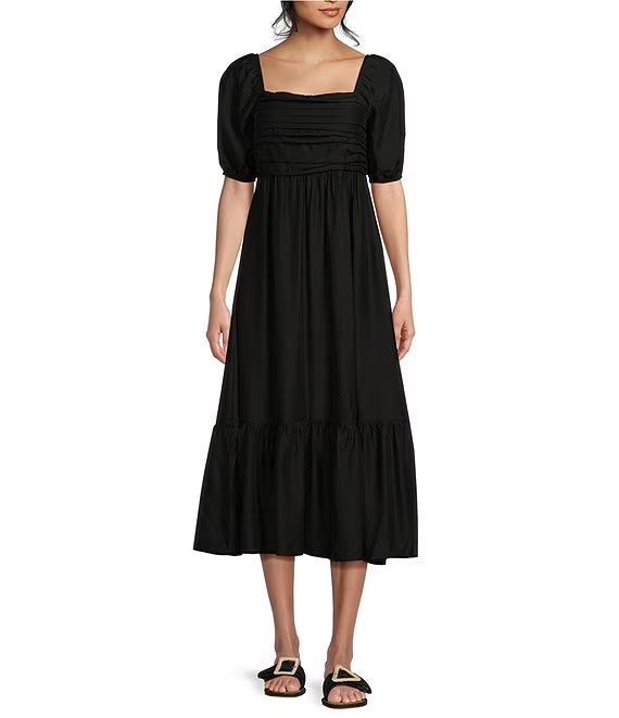 Vestido de fiesta de longitud media con mangas plisadas tipo farol