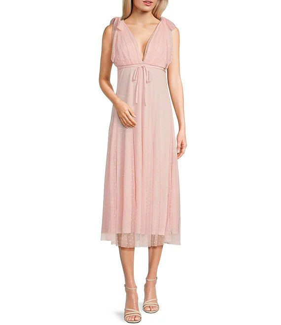 Vestido de fiesta de longitud media sin mangas con escote en V y lunares redondos