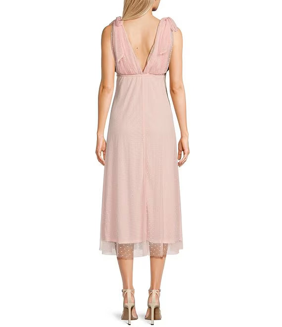 Vestido de fiesta de longitud media sin mangas con escote en V y lunares redondos