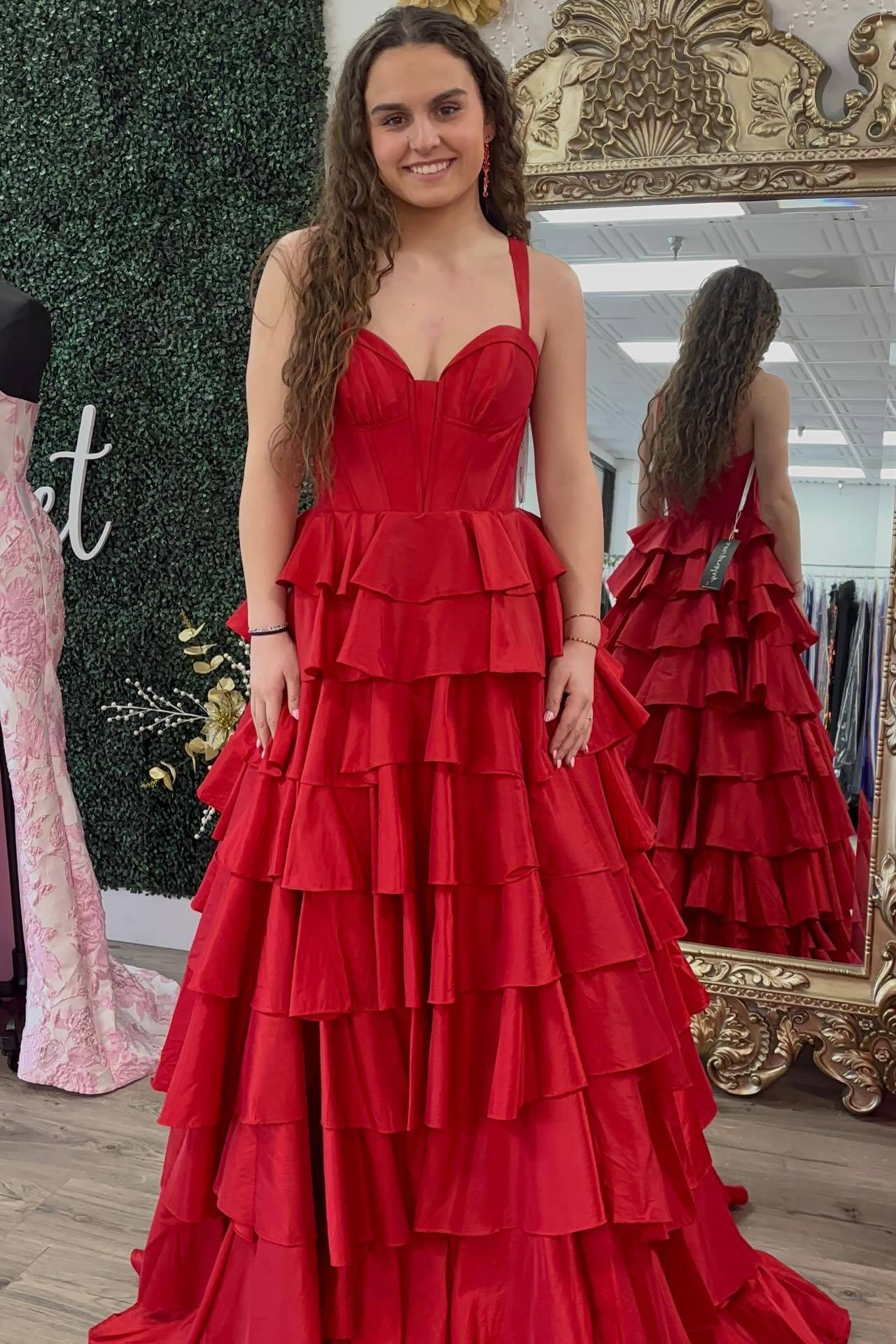 Dramatic Satin red ruffled prom dress with spaghetti straps, sweetheart neck, corset bodice, and tiered ball gown skirt