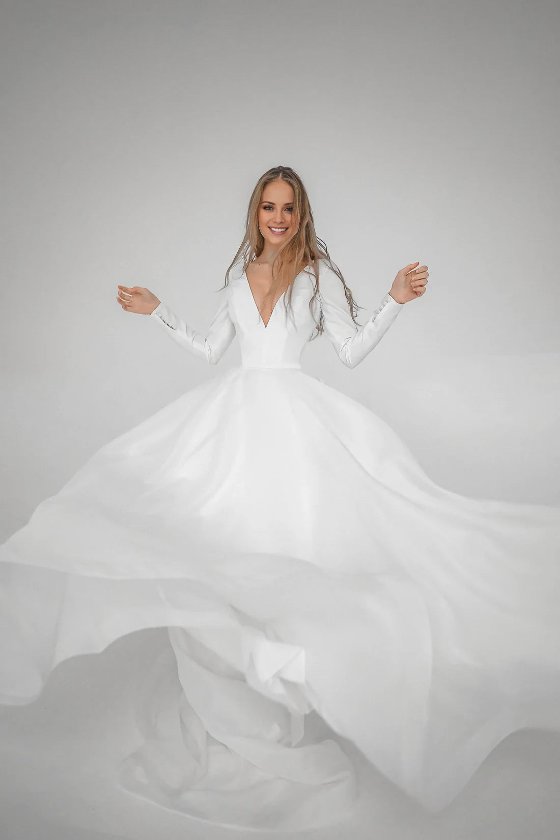 Ivory Crepe A-Line Floor-Length Evening Dress featuring a Plunging V-Neck