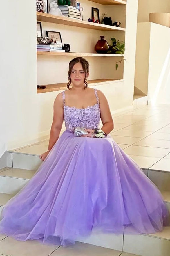Enchanting lace corset prom dress with spaghetti straps, square neck, and tulle ball gown skirt