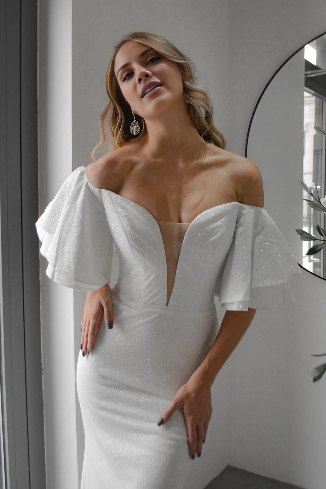 White Glitter Sheath/column Gown with V-Neck and Off-the-Shoulder Ruffles
