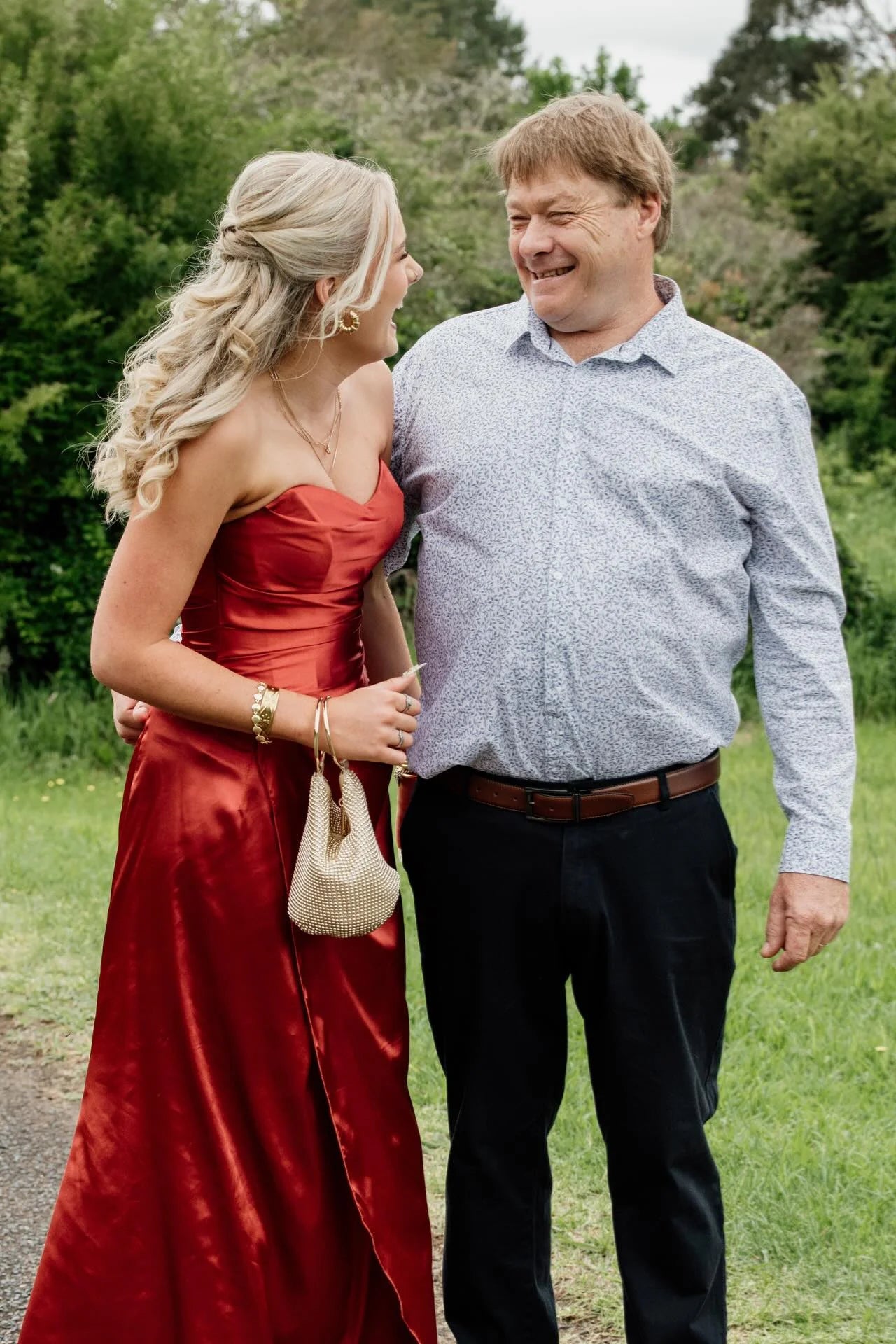 Glamorous Satin Prom Dresses with Strapless Sweetheart Neckline, Ruched Bodice, Lace-Up Back Bow Detail, Daring High Slit and Voluminous Train Formal Gown