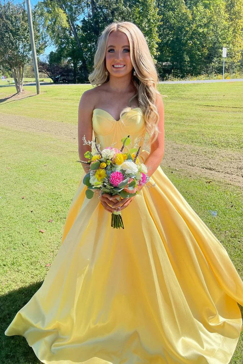 Glam satin ball gown prom dress with strapless sweetheart neck, corset bodice, and voluminous skirt