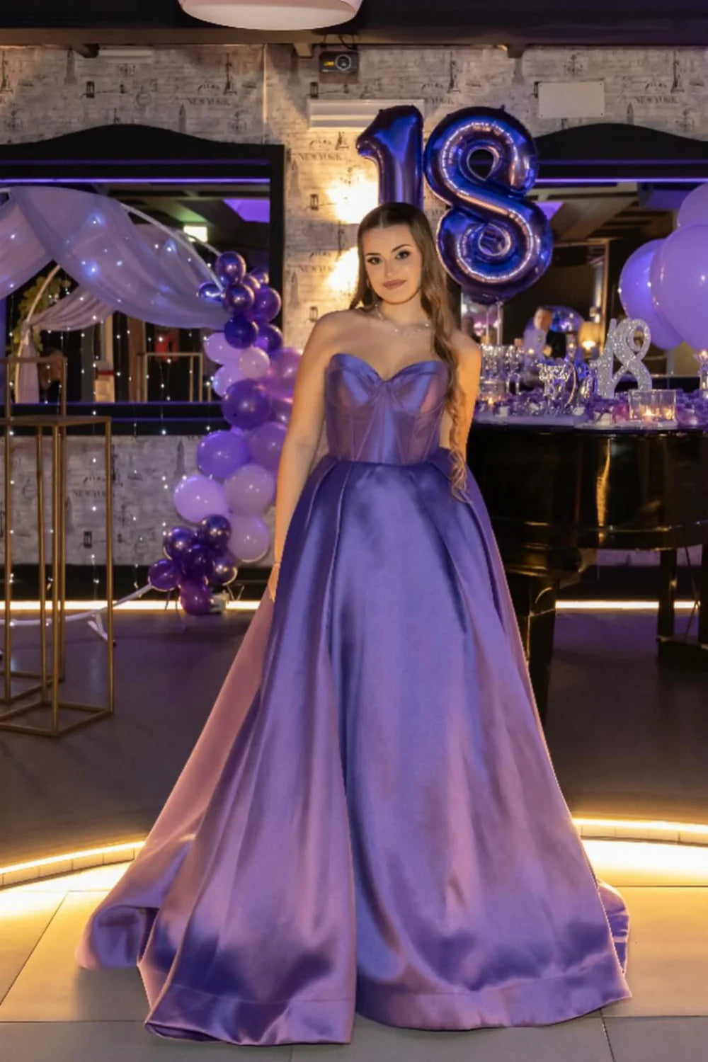Glam satin ball gown prom dress with strapless sweetheart neck, corset bodice, and voluminous skirt