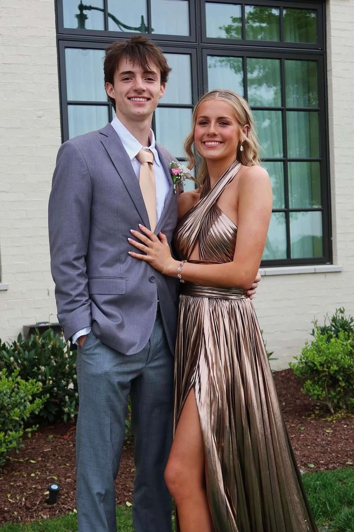 Metallic Halter Prom Dress with Twist Front, Cutout Detail, Pleated Skirt & High Front Slit