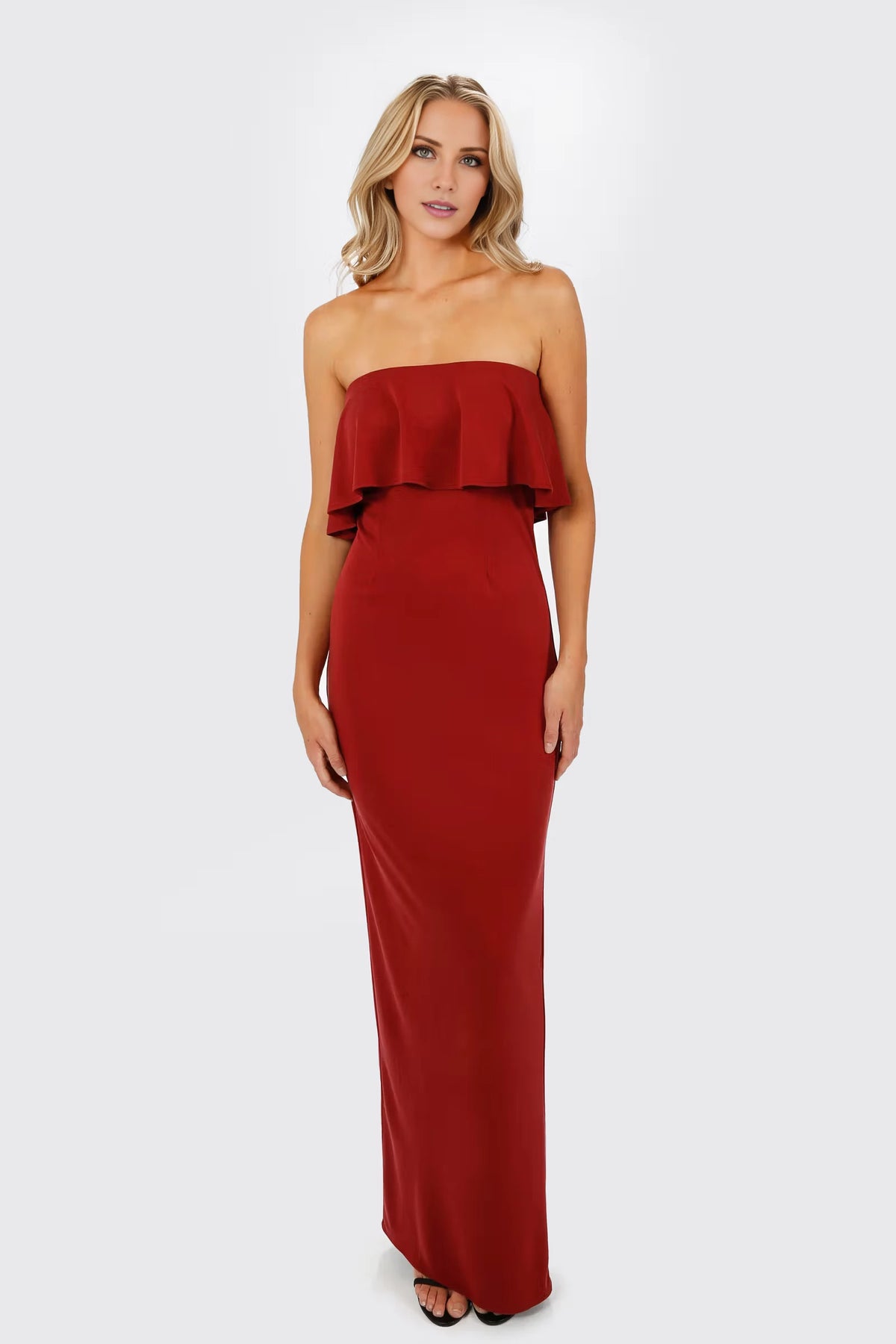 Vestido de fiesta con cuello descubierto, sin mangas, sin tirantes, espalda descubierta, abertura y largo hasta el suelo 