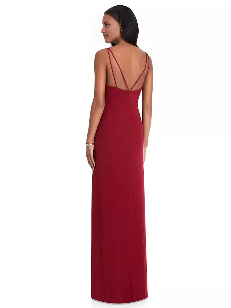 Vestido de fiesta largo hasta el suelo, sin mangas, con escote redondo, hombros descubiertos y espalda descubierta con abertura lateral. 