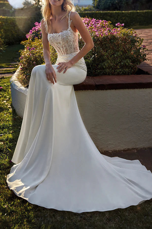 Vestido de novia con cola de pez y encaje con ilusión de cuchara