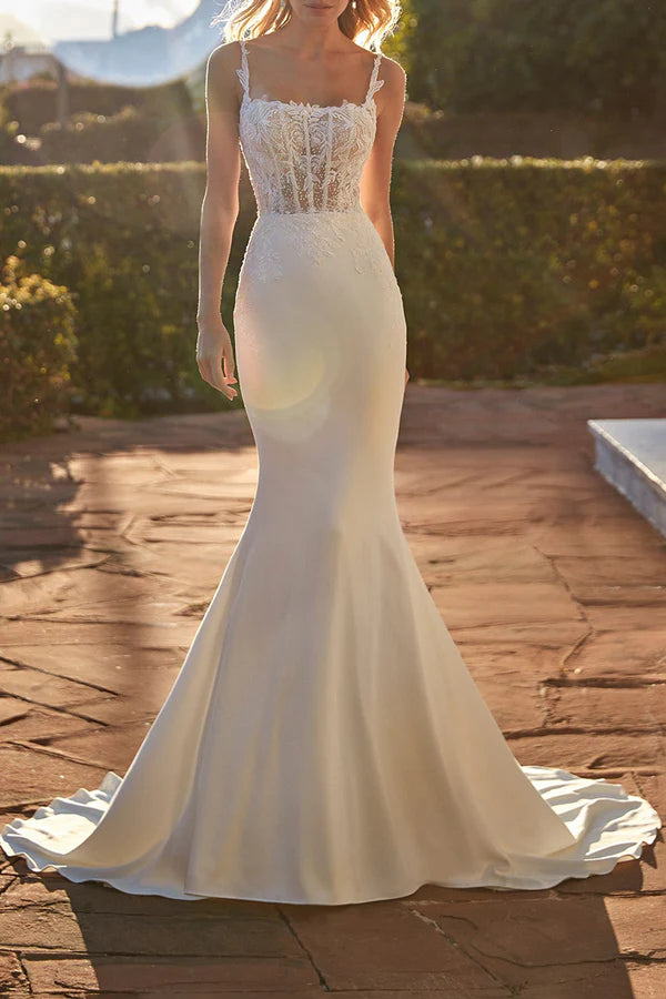 Vestido de novia con cola de pez y encaje con ilusión de cuchara