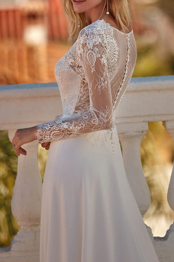 Vestido de novia de encaje con escote en V y mangas largas en forma de A