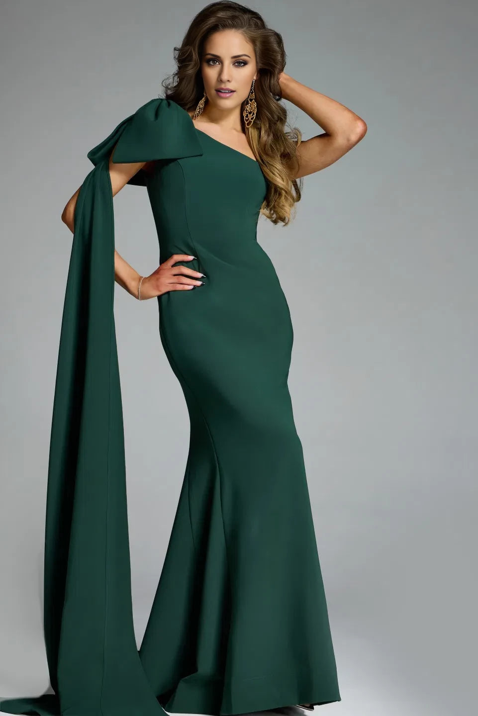 Single shoulder fishtail strap with hanging bow details and floor length evening dress