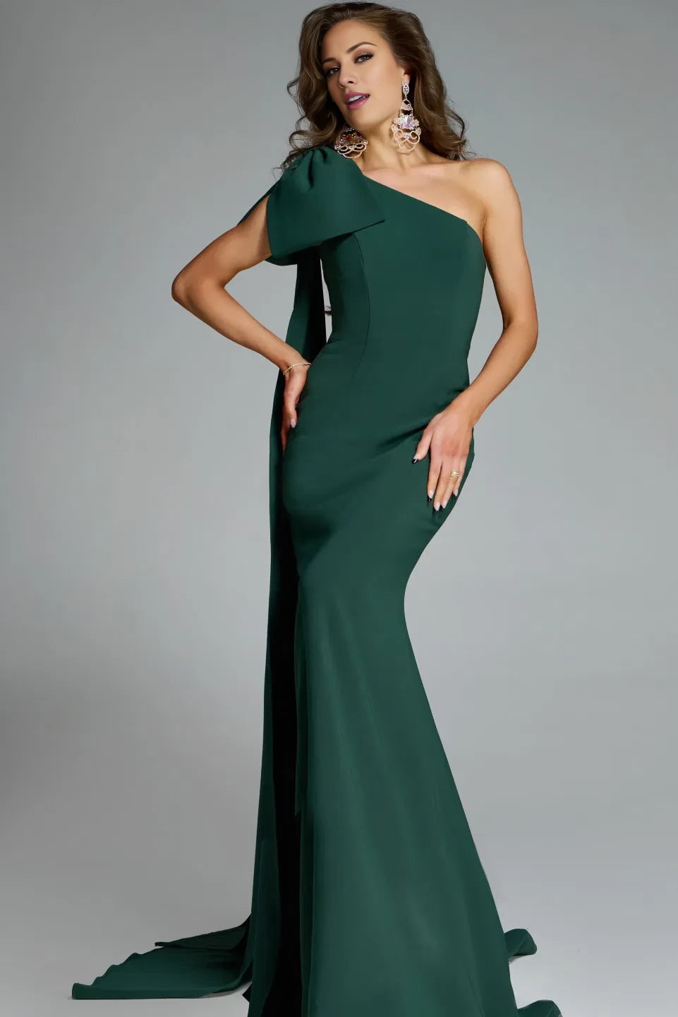 Single shoulder fishtail strap with hanging bow details and floor length evening dress