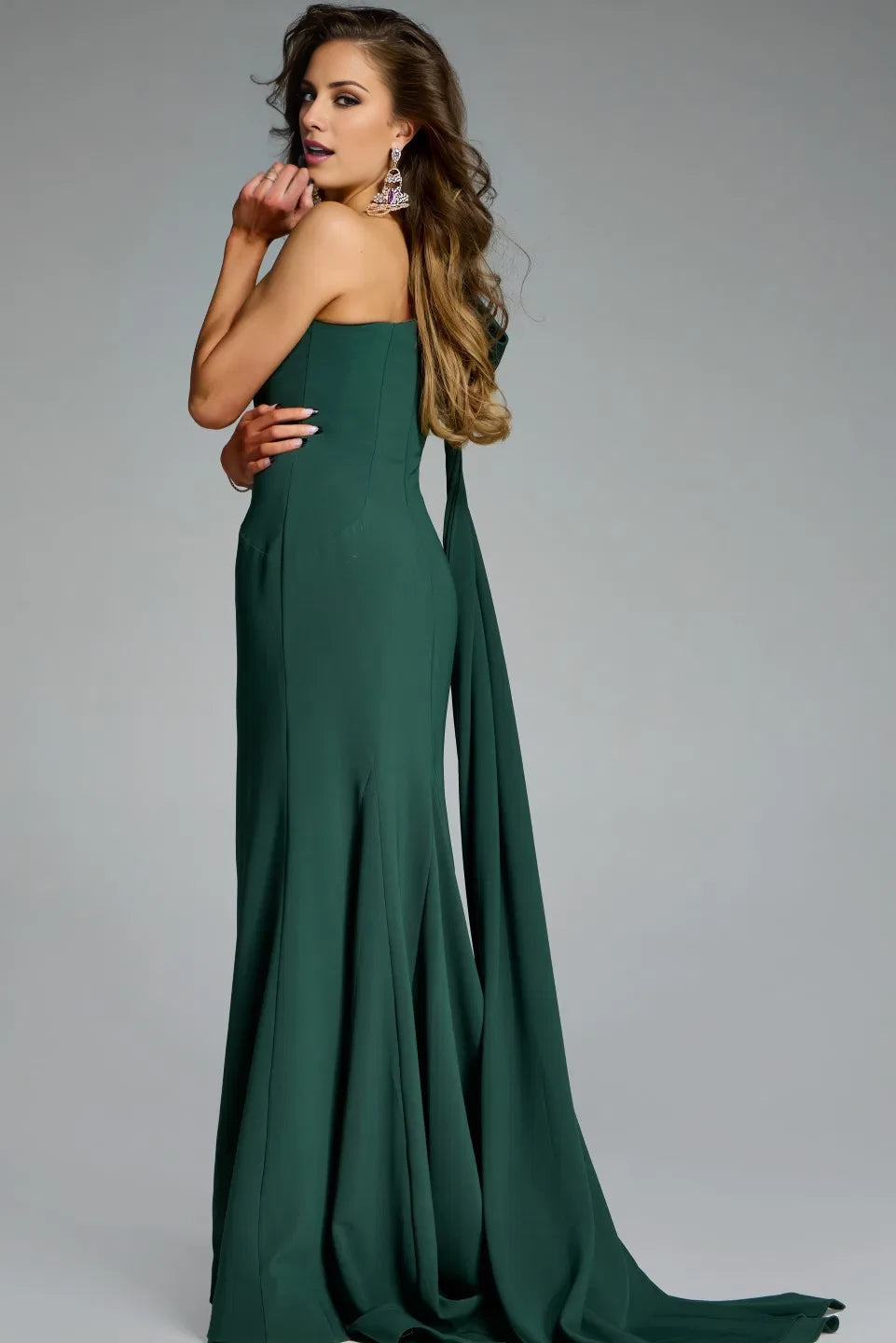 Single shoulder fishtail strap with hanging bow details and floor length evening dress