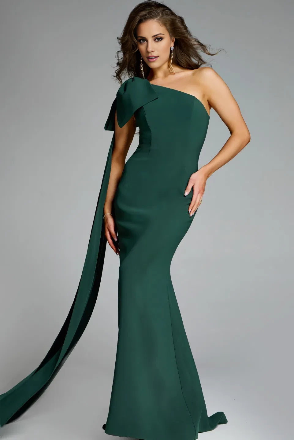 Single shoulder fishtail strap with hanging bow details and floor length evening dress