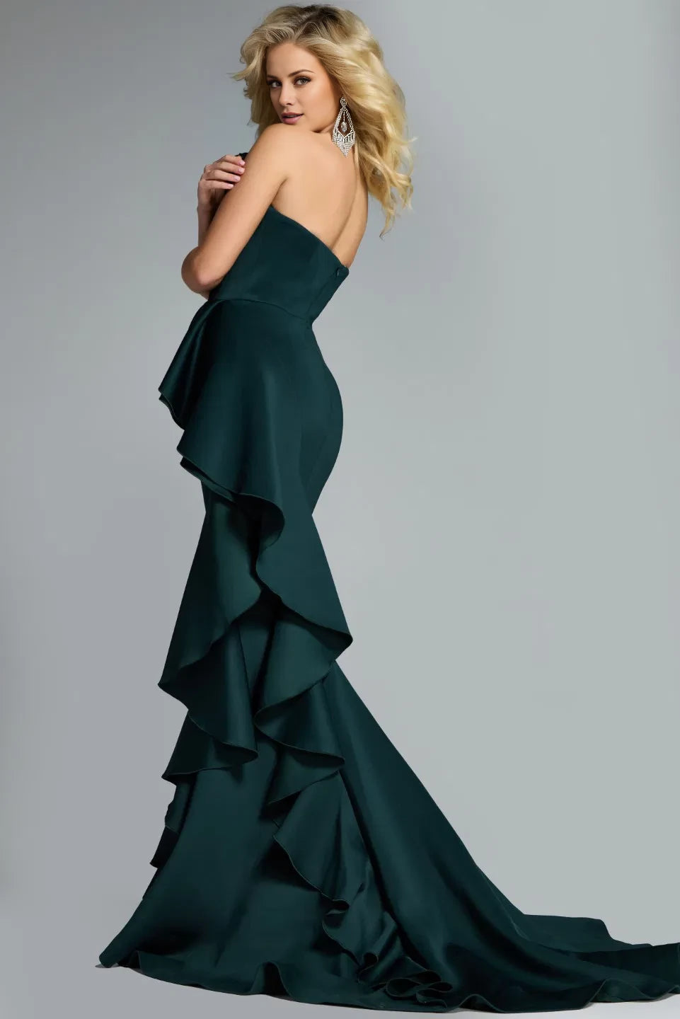 Single shoulder strap with layered hemline ruffles and floor length evening dress