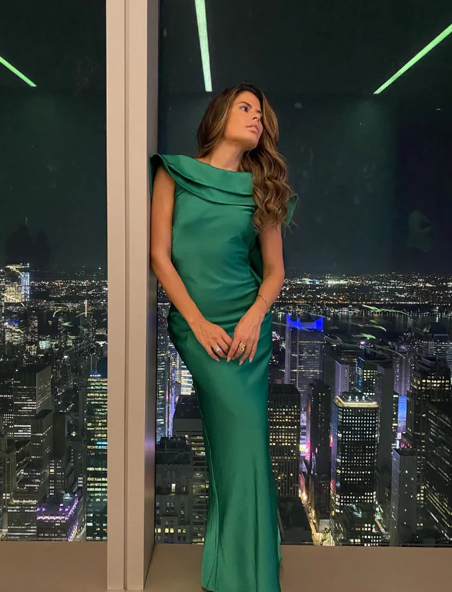 Sleek mermaid off-the-shoulder draped neckline ruffled bow-back floor-length evening dress