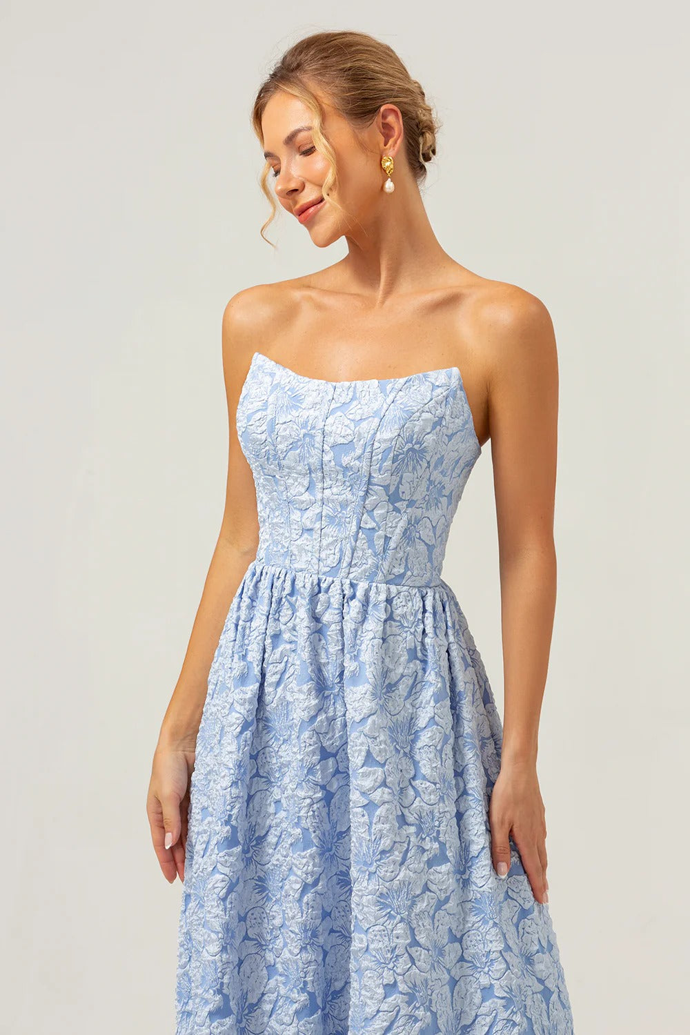 Strapless Light Blue Floral Jacquard Gown with High-Low Ruffled Hem