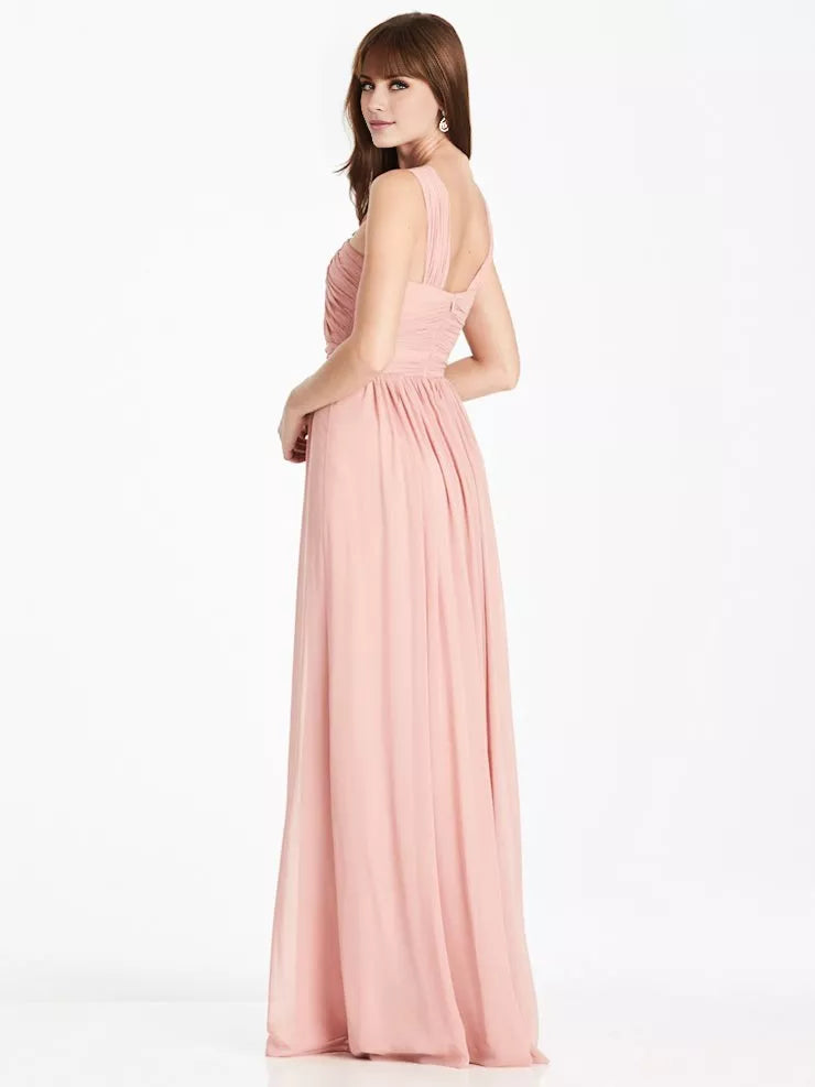 Vestido de fiesta sin mangas, con escote en V, detalle plisado y largo hasta el suelo.