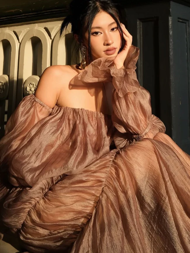 Voluminous tiered gown off-the-shoulder strapless puffed-sleeve open-back floor-length evening dress