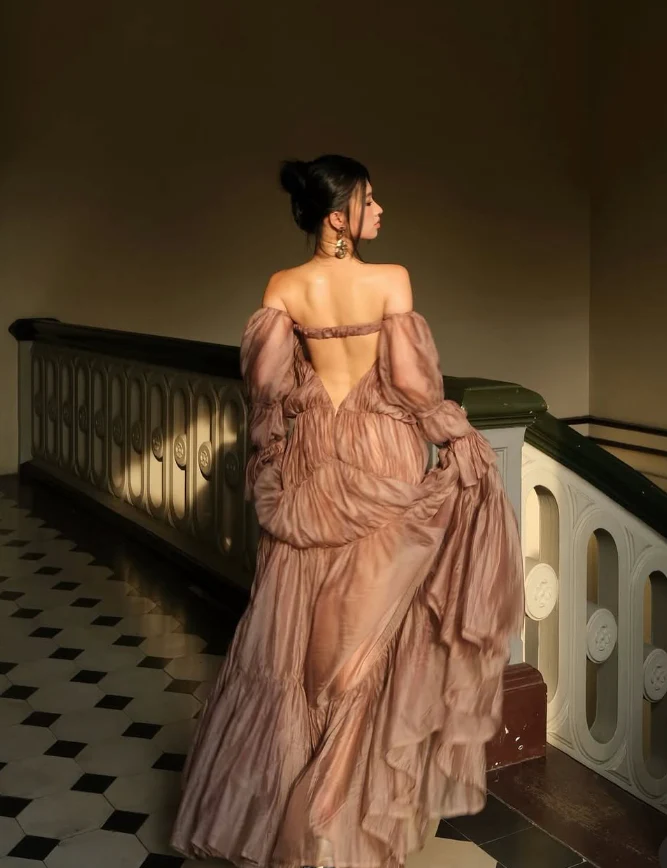 Voluminous tiered gown off-the-shoulder strapless puffed-sleeve open-back floor-length evening dress