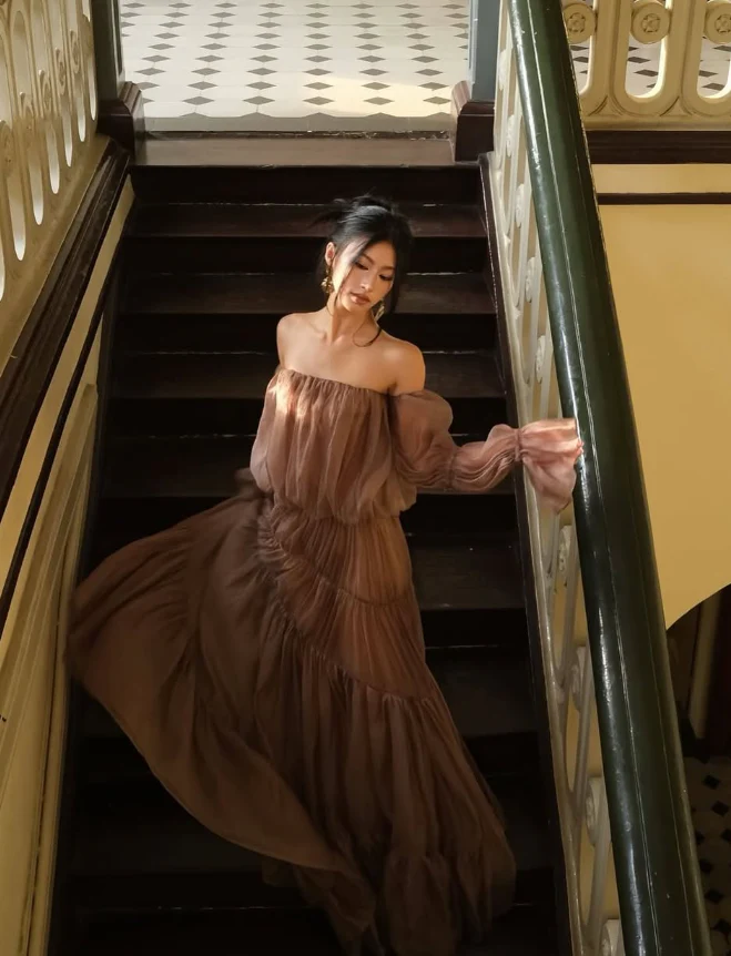 Voluminous tiered gown off-the-shoulder strapless puffed-sleeve open-back floor-length evening dress