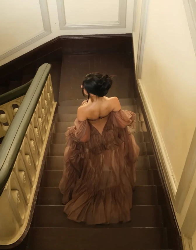 Voluminous tiered gown off-the-shoulder strapless puffed-sleeve open-back floor-length evening dress