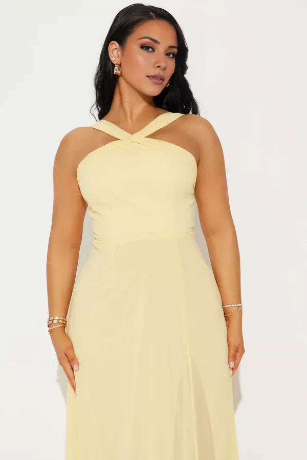 Abito da sera lungo fino al pavimento, senza maniche, con scollo a V, spalle scoperte e spacco laterale sulla schiena