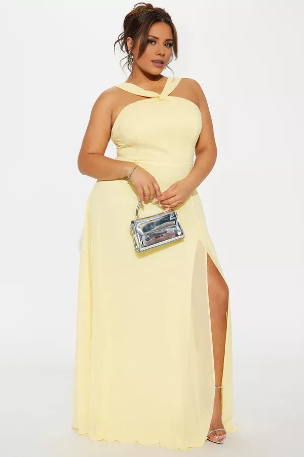 Abito da sera lungo fino al pavimento, senza maniche, con scollo a V, spalle scoperte e spacco laterale sulla schiena