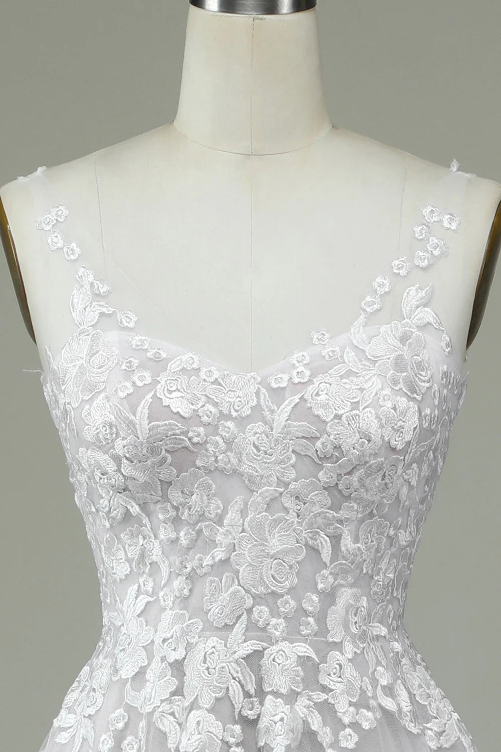 Vestido de novia sin espalda de encaje transparente color marfil