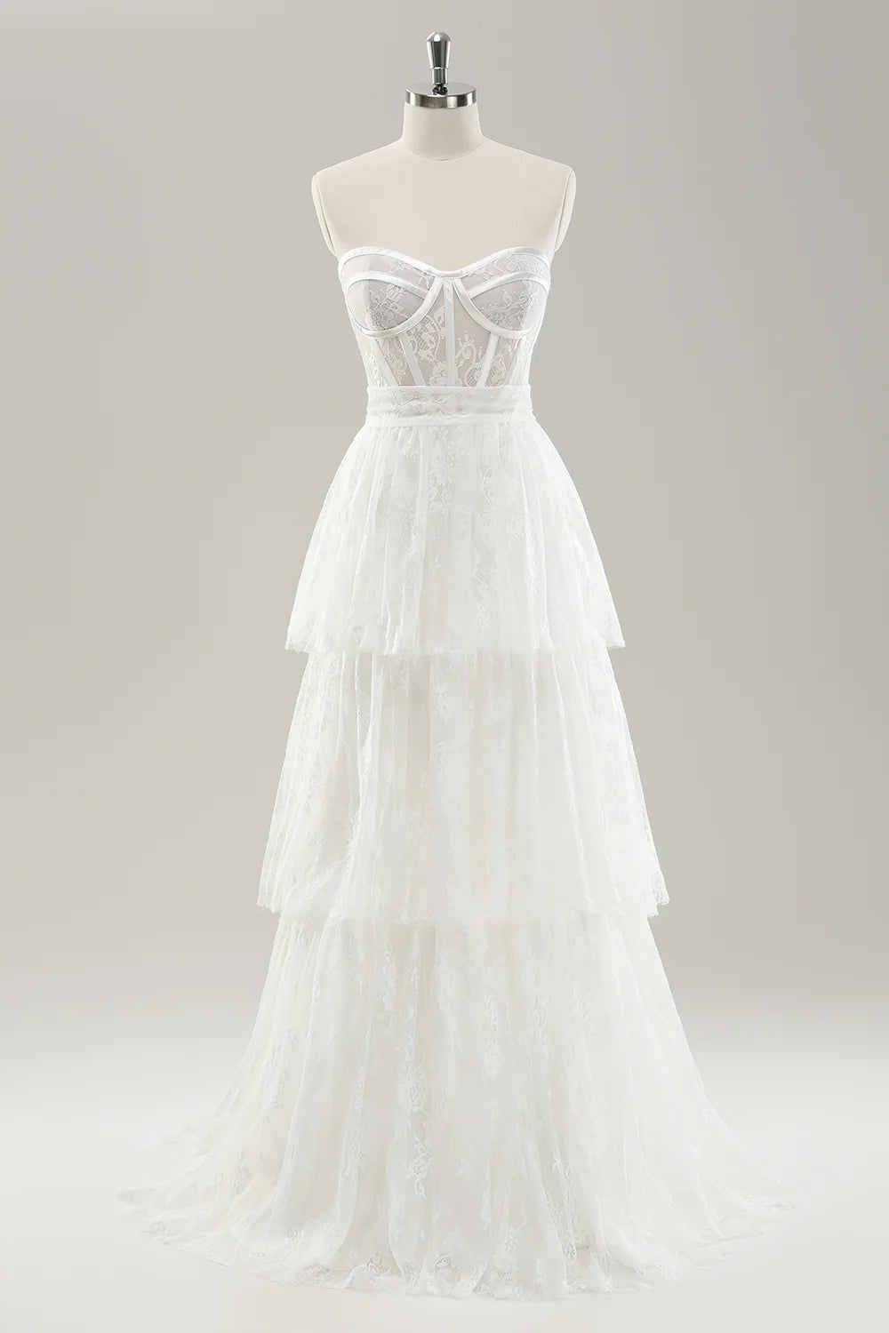 Abito da sposa lungo a strati con corsetto stretto senza spalline bianco