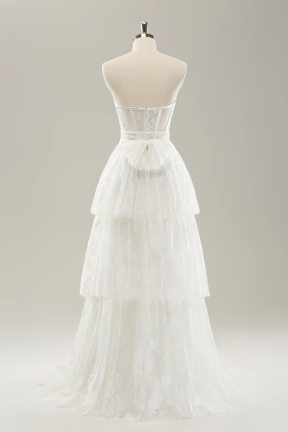 Vestido de novia largo en capas con corsé ajustado sin tirantes blanco