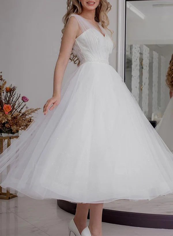 Abito da sposa a trapezio con scollo a V, senza maniche, paillettes e caviglie trasparenti