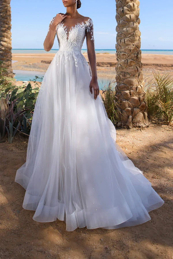 Abito da sposa a trapezio con maniche lunghe e colletto illusione in pizzo