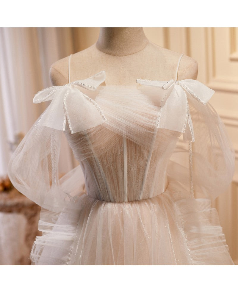 Vestido de fiesta único y noble color marfil sin mangas con hombros descubiertos Vestido de fiesta color marfil con tirantes finos transparentes y espalda descubierta