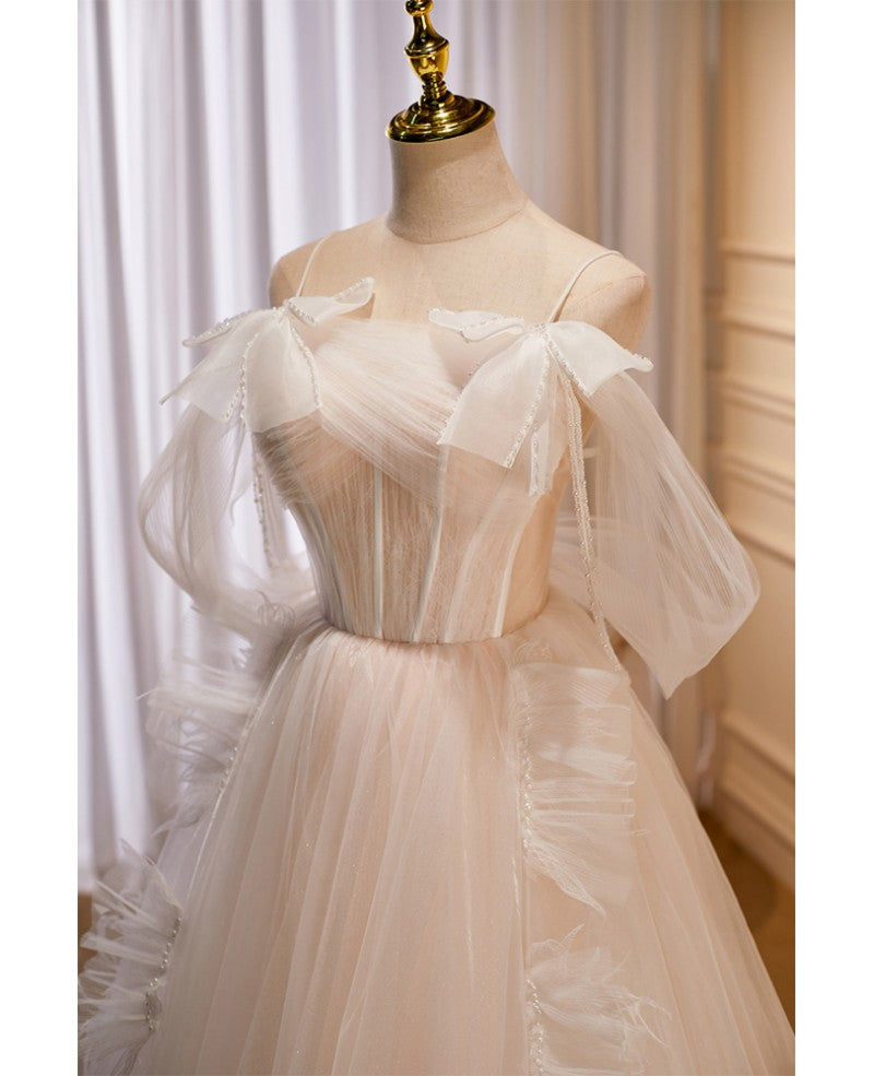 Vestido de fiesta único y noble color marfil sin mangas con hombros descubiertos Vestido de fiesta color marfil con tirantes finos transparentes y espalda descubierta