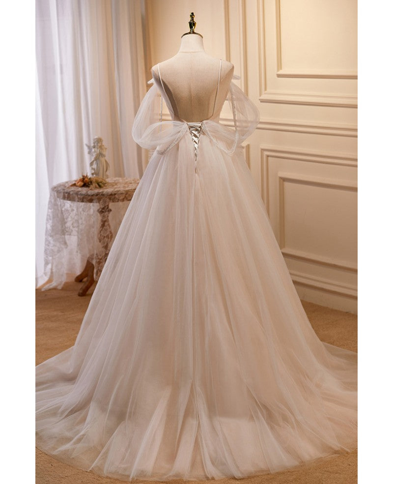 Vestido de fiesta único y noble color marfil sin mangas con hombros descubiertos Vestido de fiesta color marfil con tirantes finos transparentes y espalda descubierta