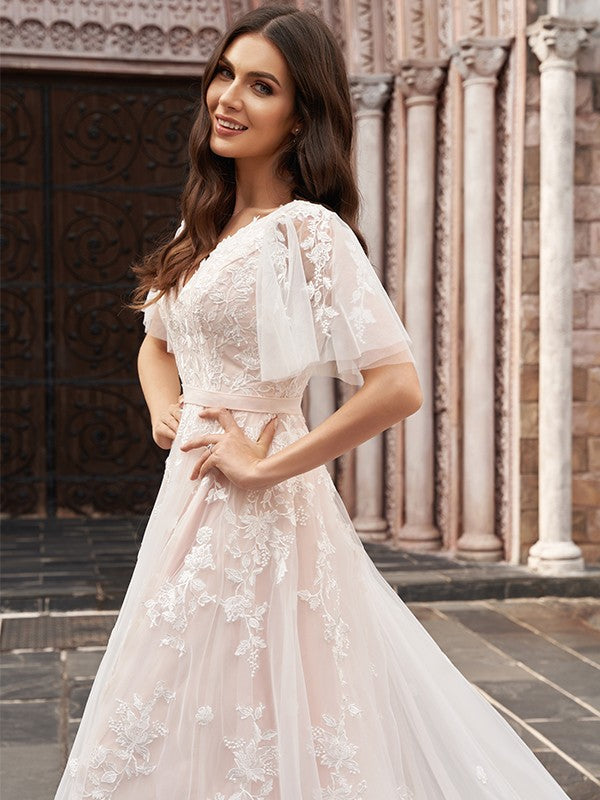 Vestido de novia corte A/princesa con apliques de tul, escote en V, mangas 1/2 y cola corte