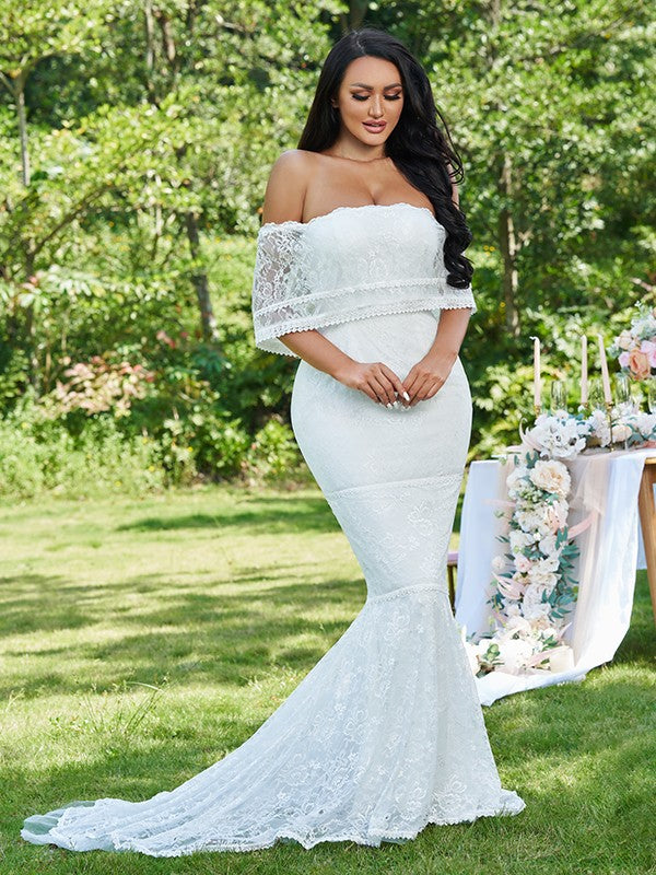 Vestidos de novia de corte trompeta/sirena con volantes, sin tirantes, sin mangas y con cola larga