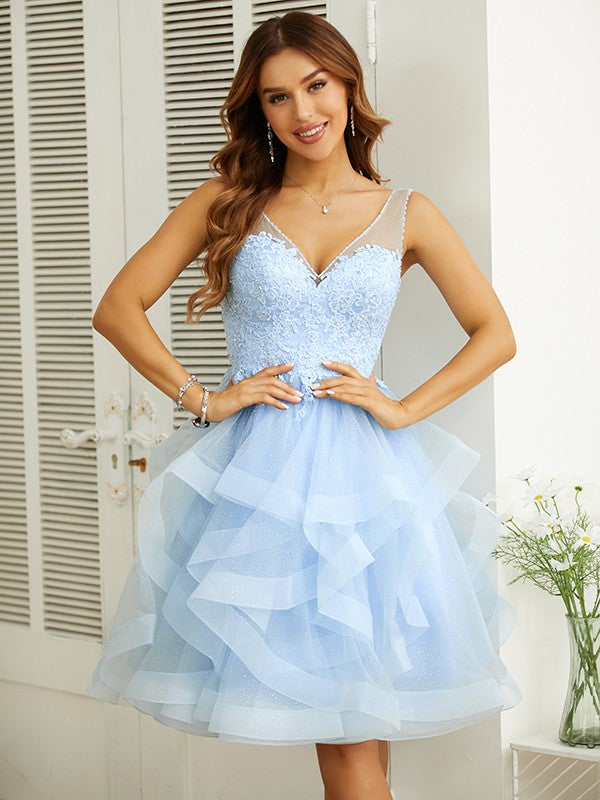 Abiti senza maniche al ginocchio con scollo a V e applicazioni in stile principessa/a