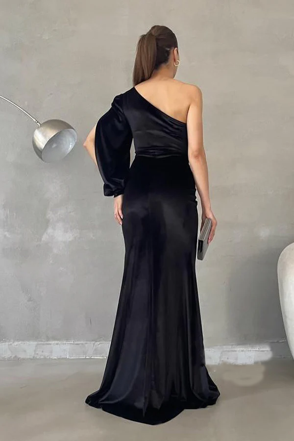 Vestido de fiesta único y moderno con un solo hombro y manga larga.