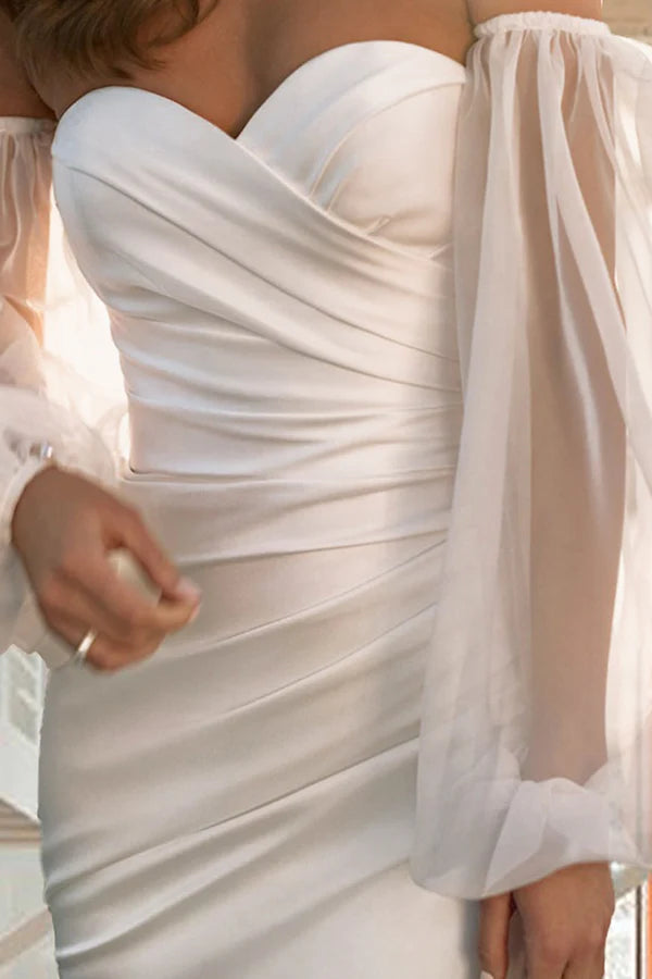 Vestido de novia de verano de manga larga con corte sirena y altavoz.