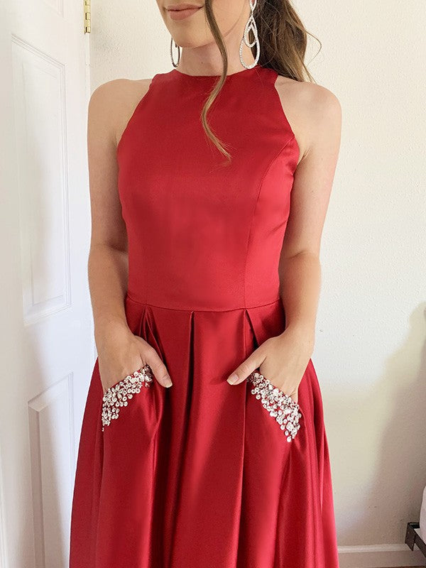 Vestidos de satén con escote halter, sin mangas, corte princesa y cuentas hasta el suelo