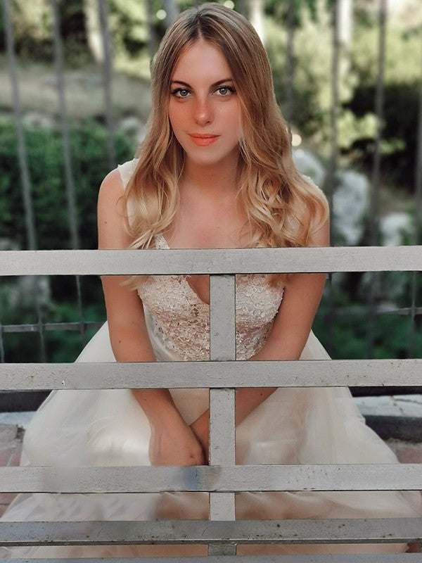 Vestidos de corte A/princesa sin mangas con apliques de tul y escote en V hasta el suelo