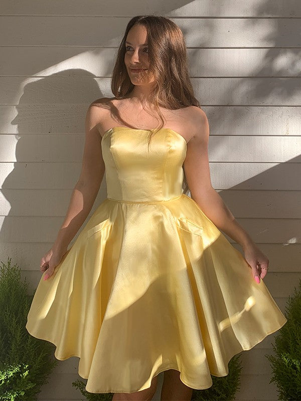 Yellow Satin A-Line Short Dress with Strapless Bodice and Side Pockets for Prom and Homecoming
