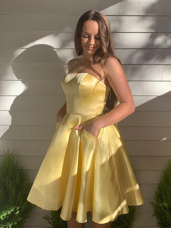Yellow Satin A-Line Short Dress with Strapless Bodice and Side Pockets for Prom and Homecoming